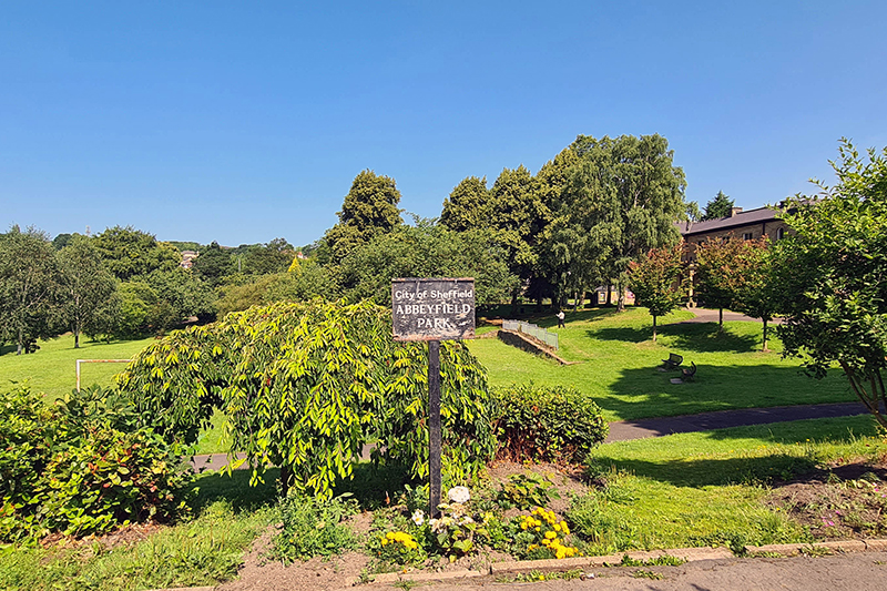 Park with sign that reads 'City of Sheffield - Abbeyfield Park'