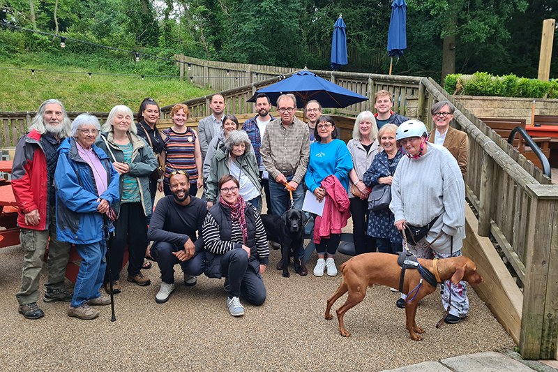 Group of people lined up in a park