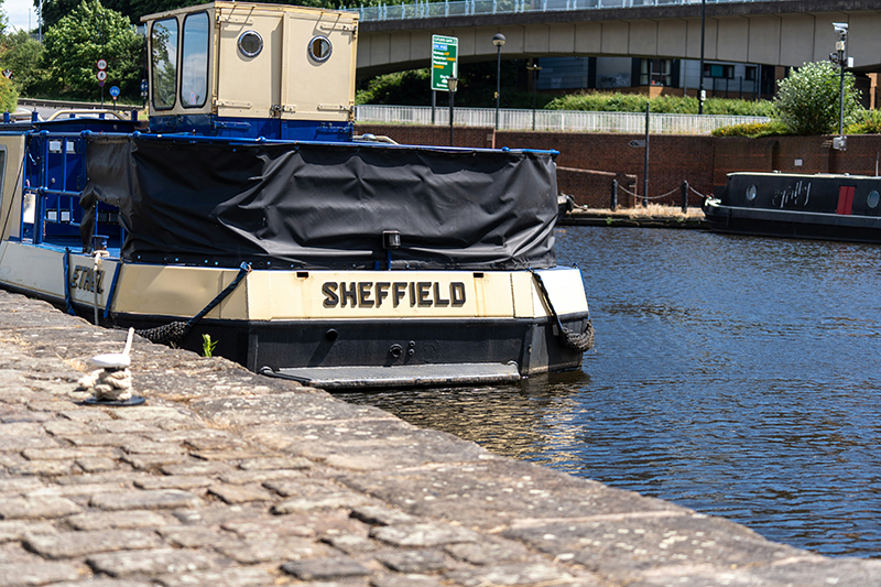 Boat named 'Sheffield' on a canal